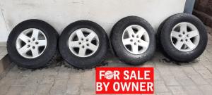4 JEEP RIMS & TIRES * FOR SALE BY OWNER *